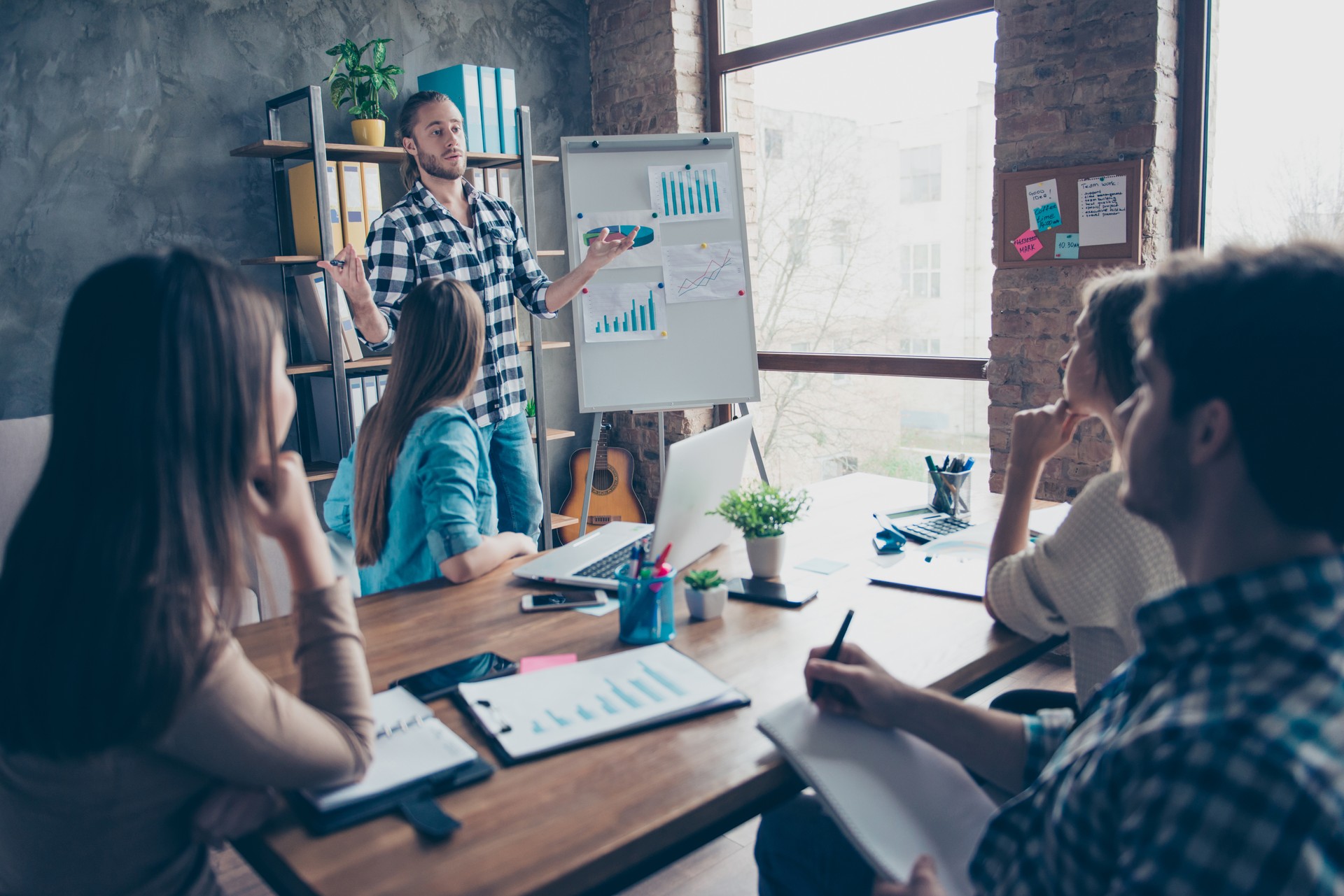 Photo of business concept. Corporate people sitting at conference training, planning, learning, coaching, manager making a presentation about start up, coacher talking about work system in the company